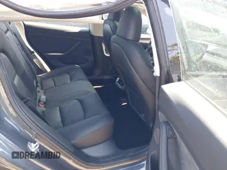 2023 Tesla Model 3 z VIN 5YJ3E1EAXPF710024, wystawiony jako IAAI lot #41228608 z przebiegiem 10 481 mil mil oraz . Historia ofert i sprzedaży dostępna na DreamBid. Obrazek 8.