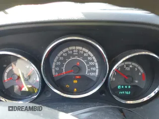 2012 Dodge Caliber SXT with VIN 1C3CDWDA7CD533844, listed as a IAAI auction lot 41391978 with 149,762 mi miles and . Bid and sale history available at DreamBid. Image 7.