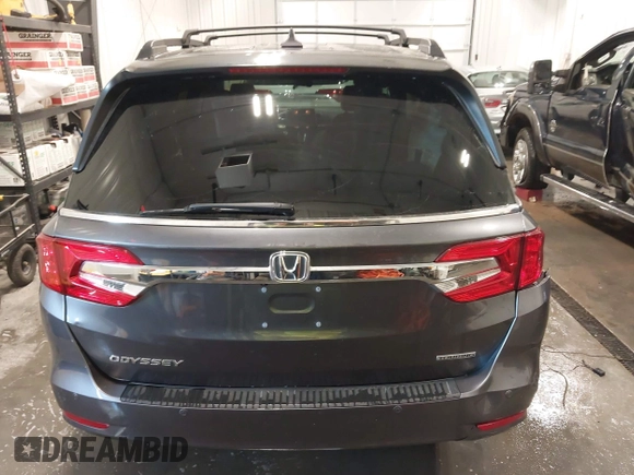 2018 Honda Odyssey Touring with VIN 5FNRL6H84JB041309, listed as a IAAI auction lot 42272247 with 90,371 mi miles and . Bid and sale history available at DreamBid. Image 16.