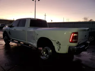 2023 Ram 3500 Laramie with VIN 3C63RRJL6PG521799, listed as a Copart auction lot 78871084 with 101,301 mi miles and Salvage Title. Bid and sale history available at carsss.com. Image 2.
