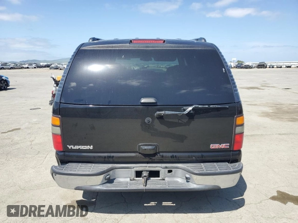2005 GMC Yukon SLT with VIN 1GKEC13T95R258971, listed as a Copart auction lot 53548835 with 329,345 mi miles and Salvage Title. Bid and sale history available at carsss.com. Image 6.