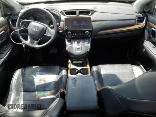 2020 Honda CR-V Touring z VIN 7FART6H93LE013954, wystawiony jako Copart lot #56970555 z przebiegiem 134 931 mil mil oraz Szkoda całkowita • Salvage title. Historia ofert i sprzedaży dostępna na DreamBid. Obrazek 8.