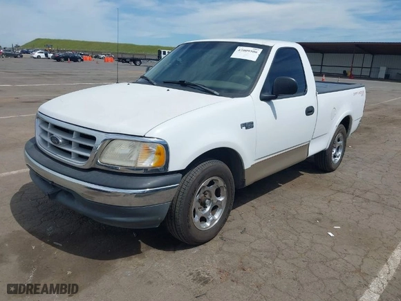 1999 Ford F-150 Work Series with VIN 2FTZF1729XCA83871, listed as a IAAI auction lot 42009506 with 234,988 mi miles. Bid and sale history available at carsss.com. Image 2.