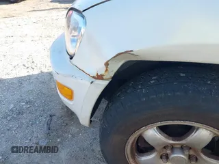 2000 Toyota RAV4 with VIN JT3GP10VXY7065795, listed as a IAAI auction lot 41792644 with 176,444 mi miles and . Bid and sale history available at DreamBid. Image 6.