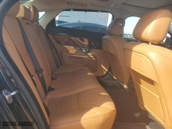 2016 Jaguar XJ with VIN SAJWJ2GDXG8W03143, listed as a Copart auction lot 86467114 with NaN miles and Salvage Title. Bid and sale history available at carsss.com. Image 10.