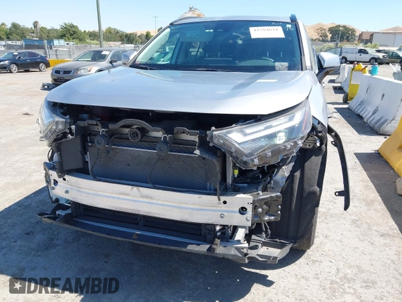 2022 Toyota RAV4 Hybrid XLE with VIN 4T3RWRFV2NU066761, listed as a IAAI auction lot 42784621 with 24,711 mi miles and . Bid and sale history available at DreamBid. Image 6.