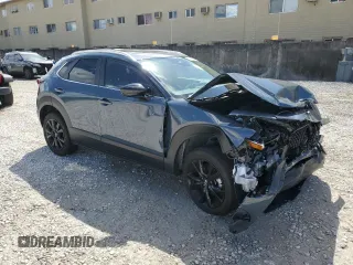2024 Mazda CX-30 2.5 S Carbon Edition with VIN 3MVDMBCMXRM673483, listed as a Copart auction lot 46810935 with 3,047 mi miles and Salvage Title. Bid and sale history available at carsss.com. Image 4.