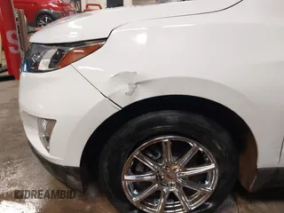 2019 Chevrolet Equinox LT z VIN 2GNAXUEV0K6182506, wystawiony jako IAAI lot #41377011 z przebiegiem 96 085 mil mil oraz . Historia ofert i sprzedaży dostępna na DreamBid. Obrazek 6.