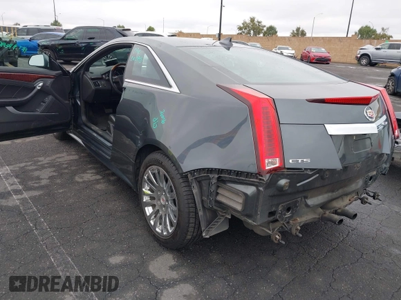 2011 Cadillac CTS Performance with VIN 1G6DJ1ED7B0126314, listed as a IAAI auction lot 42185363 with 80,676 mi miles and . Bid and sale history available at DreamBid. Image 3.