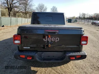 2020 Jeep Gladiator Rubicon z VIN 1C6JJTBG9LL184085, wystawiony jako Copart lot #51382115 z przebiegiem 83 375 mil mil oraz Szkoda całkowita • Salvage title. Historia ofert i sprzedaży dostępna na DreamBid. Obrazek 6.