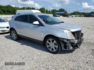 2015 Cadillac SRX Performance Collection with VIN 3GYFNCE3XFS573287, listed as a Copart auction lot 59927205 with 157,322 mi miles and Salvage title. Bid and sale history available at DreamBid. Image 4.