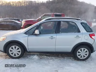 2011 Suzuki SX4 Crossover with VIN JS2YB5A36B6305317, listed as a IAAI auction lot 41333007 with 84,967 mi miles. Bid and sale history available at carsss.com. Image 14.