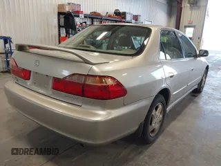1999 Honda Accord EX z VIN JHMCG5651XC030706, wystawiony jako IAAI lot #42437226 z przebiegiem 185 310 mil mil oraz . Historia ofert i sprzedaży dostępna na DreamBid. Obrazek 4.