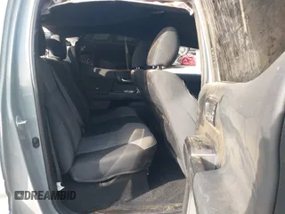 2022 Toyota Tacoma SR with VIN 3TYCZ5AN2NT096491, listed as a IAAI auction lot 42093897 with 47,041 mi miles and . Bid and sale history available at DreamBid. Image 8.