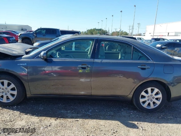 2007 Toyota Camry Hybrid with VIN JTNBB46K173026355, listed as a IAAI auction lot 41164522 with 197,696 mi miles. Bid and sale history available at carsss.com. Image 15.