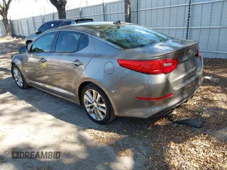 2014 Kia Optima SXL Turbo with VIN 5XXGR4A69EG284510, listed as a IAAI auction lot 41901608 with 81,877 mi miles and . Bid and sale history available at DreamBid. Image 3.