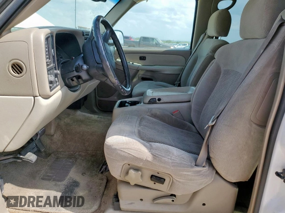 2002 Chevrolet Tahoe LS with VIN 1GNEC13Z32R200857, listed as a Copart auction lot 59812865 with 116,823 mi miles and Salvage title. Bid and sale history available at DreamBid. Image 7.