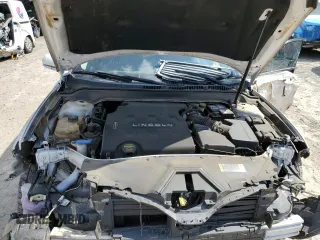 2013 Lincoln MKZ z VIN 3LN6L2GK2DR823745, wystawiony jako Copart lot #54887275 z przebiegiem 163 267 mil mil oraz Szkoda całkowita • Salvage title. Historia ofert i sprzedaży dostępna na DreamBid. Obrazek 11.