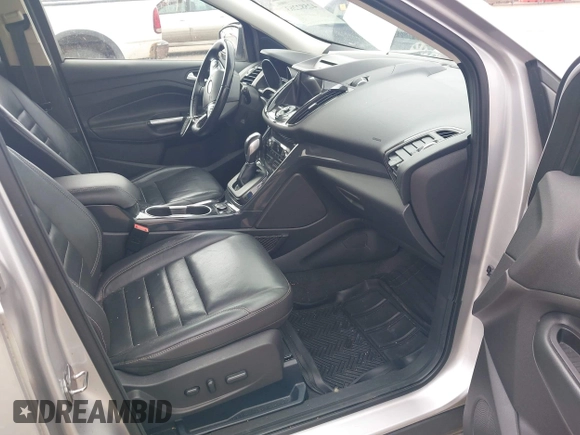 2016 Ford Escape Titanium with VIN 1FMCU9JX3GUC86930, listed as a IAAI auction lot 42582263 with 113,386 mi miles and . Bid and sale history available at DreamBid. Image 5.