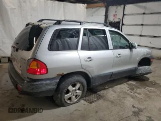 2004 Hyundai Santa Fe GLS with VIN KM8SC73D74U681615, listed as a Copart auction lot 76599554 with 163,530 mi miles and Salvage Title. Bid and sale history available at carsss.com. Image 3.