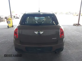2012 MINI Countryman with VIN WMWZB3C51CWM04563, listed as a IAAI auction lot 42564564 with 95,760 mi miles and . Bid and sale history available at DreamBid. Image 16.