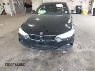 2016 BMW 4 Series 428i xDrive with VIN WBA4C9C58GG139151, listed as a IAAI auction lot 42151827 with 92,698 mi miles and . Bid and sale history available at DreamBid. Image 6.