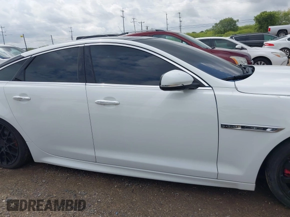 2014 Jaguar XJ R with VIN SAJWA1EK3EMV58692, listed as a IAAI auction lot 42663979 with 111,386 mi miles and . Bid and sale history available at DreamBid. Image 13.