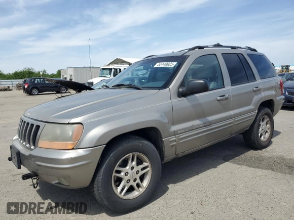 1999 Jeep Grand Cherokee Limited with VIN 1J4GW68N4XC663476, listed as a Copart auction lot 52449925 with 174,583 mi miles and Salvage Title. Bid and sale history available at carsss.com. Image 1.
