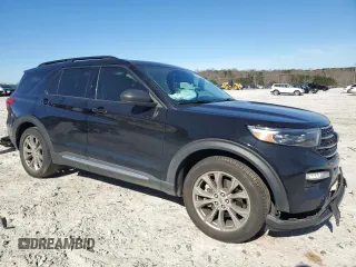 2021 Ford Explorer XLT with VIN 1FMSK7DH2MGC06991, listed as a Copart auction lot 48494615 with 61,222 mi miles and Salvage Title. Bid and sale history available at carsss.com. Image 4.