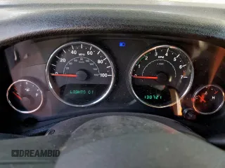 2014 Jeep Wrangler Sport z VIN 1C4AJWAG7EL181121, wystawiony jako Copart lot #42599235 z przebiegiem 130 721 mil mil oraz Szkoda całkowita • Salvage title. Historia ofert i sprzedaży dostępna na DreamBid. Obrazek 9.