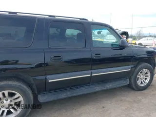 2003 Chevrolet Suburban LS with VIN 3GNEC16T03G334122, listed as a IAAI auction lot 41860521 with 195,648 mi miles. Bid and sale history available at carsss.com. Image 13.