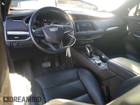 2021 Cadillac XT4 FWD Luxury с VIN 1GYAZAR4XMF066381, выставлен на аукционе Copart как лот 84615464 с пробегом 80 018 миль миль и Списание • Salvage title. История ставок и продаж доступна на DreamBid. Изображение 8.