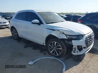 2023 Audi Q5 S line Premium Plus z VIN WA1EAAFY9P2197359, wystawiony jako IAAI lot #41968779 z przebiegiem 26 912 mil mil oraz . Historia ofert i sprzedaży dostępna na DreamBid. Obrazek 1.
