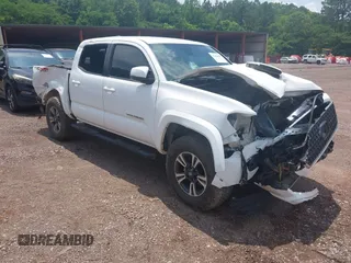 2019 Toyota Tacoma SR with VIN 3TMCZ5ANXKM272694, listed as a IAAI auction lot 42286422 with 106,451 mi miles and . Bid and sale history available at DreamBid. Image 1.