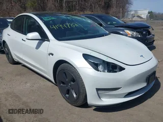 2023 Tesla Model 3 with VIN 5YJ3E1EA4PF570830, listed as a IAAI auction lot 41947821 with 52,550 mi miles and . Bid and sale history available at DreamBid. Image 1.