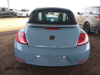 2013 Volkswagen Beetle 2.5L with VIN 3VW5P7AT9DM830477, listed as a IAAI auction lot 41957389 with Not Provided miles and . Bid and sale history available at DreamBid. Image 16.