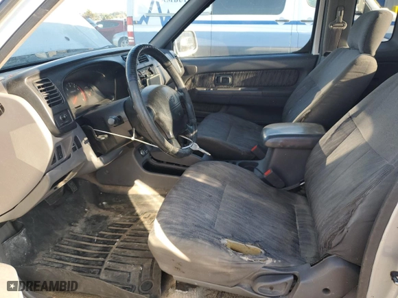2000 Nissan Frontier 2WD XE with VIN 1N6ED26T1YC327635, listed as a Copart auction lot 43149525 with 922,578 mi miles and Salvage Title. Bid and sale history available at carsss.com. Image 7.