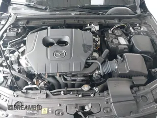 2024 Mazda 3 S with VIN 3MZBPAAM3RM419608, listed as a IAAI auction lot 42479711 with 15,833 mi miles and . Bid and sale history available at DreamBid. Image 10.