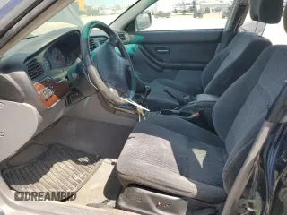 2002 Subaru Legacy Outback z VIN 4S3BH675526653798, wystawiony jako Copart lot #54212895 z przebiegiem 209 970 mil mil oraz Czysty tytuł • Clean title. Historia ofert i sprzedaży dostępna na DreamBid. Obrazek 7.