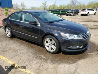 2015 Volkswagen CC Sport z VIN WVWBP7AN8FE804114, wystawiony jako Copart lot #54880245 z przebiegiem 124 639 mil mil oraz Tytuł czysty. Historia ofert i sprzedaży dostępna na DreamBid. Obrazek 4.