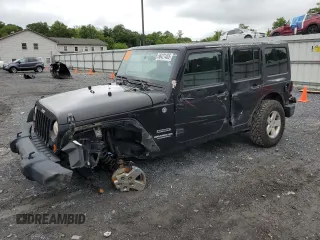 2012 Jeep Wrangler Unlimited Sport z VIN 1C4BJWDG9CL102626, wystawiony jako Copart lot #58421455 z przebiegiem 128 421 mil mil oraz Szkoda całkowita • Salvage title. Historia ofert i sprzedaży dostępna na DreamBid. Obrazek 1.