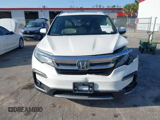 2019 Honda Pilot Touring 8-Passenger z VIN 5FNYF6H98KB016992, wystawiony jako IAAI lot #42275295 z przebiegiem 82 154 mil mil oraz . Historia ofert i sprzedaży dostępna na DreamBid. Obrazek 12.