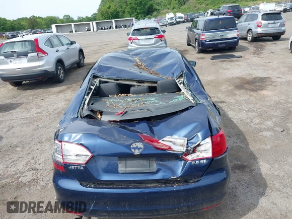 2013 Volkswagen Jetta SE z VIN 3VWDP7AJ0DM292598, wystawiony jako IAAI lot #42360798 z przebiegiem 169 885 mil mil oraz . Historia ofert i sprzedaży dostępna na DreamBid. Obrazek 6.