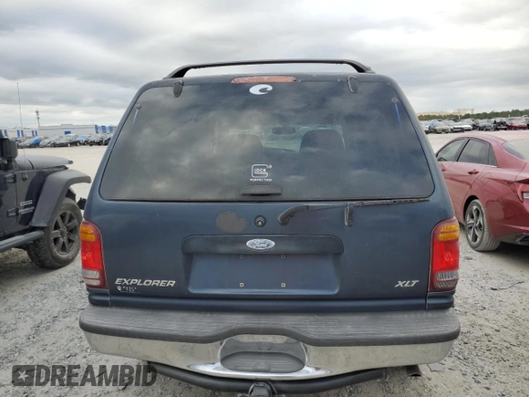1998 Ford Explorer XLT with VIN 1FMZU32P0WUD21265, listed as a Copart auction lot 73702364 with 211,096 mi miles and Salvage title. Bid and sale history available at DreamBid. Image 6.
