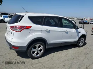 2014 Ford Escape SE z VIN 1FMCU9GX2EUE42010, wystawiony jako Copart lot #59228265 z przebiegiem 107 863 mil mil oraz Czysty tytuł • Clean title. Historia ofert i sprzedaży dostępna na DreamBid. Obrazek 3.