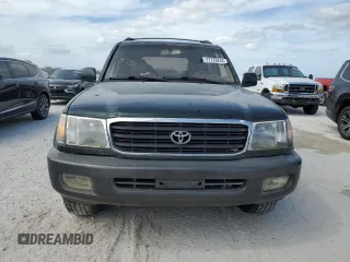 1999 Toyota Land Cruiser with VIN JT3HT05J9X0027448, listed as a Copart auction lot 77175814 with 0 mi miles and Salvage Title. Bid and sale history available at carsss.com. Image 5.
