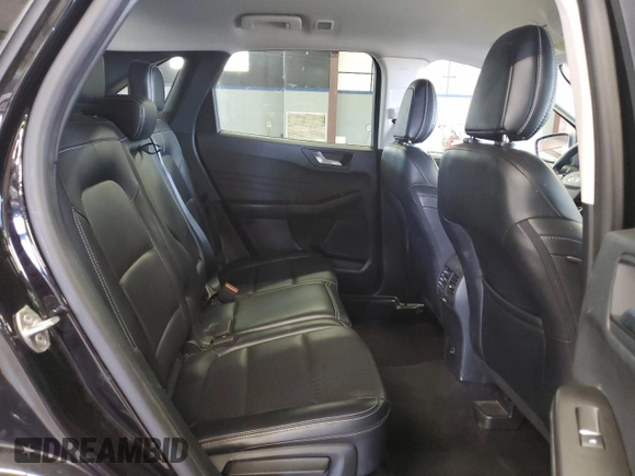 2021 Ford Escape SEL with VIN 1FMCU9H64MUA50988, listed as a Copart auction lot 54517685 with 122,593 mi miles and Salvage Title. Bid and sale history available at DreamBid. Image 11.