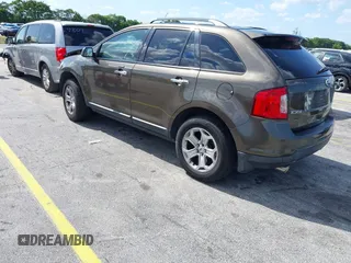 2011 Ford Edge SEL with VIN 2FMDK3JC2BBA98774, listed as a IAAI auction lot 42014358 with 178,875 mi miles. Bid and sale history available at carsss.com. Image 3.