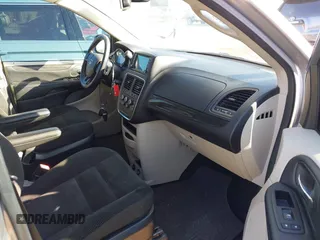 2020 Dodge Grand Caravan SE with VIN 2C4RDGBG9LR198425, listed as a IAAI auction lot 40672143 with 61,473 mi miles and . Bid and sale history available at DreamBid. Image 5.