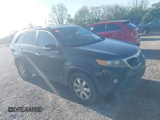 2011 Kia Sorento LX with VIN 5XYKTCA14BG079081, listed as a IAAI auction lot 42159278 with 224,639 mi miles. Bid and sale history available at carsss.com. Image 1.